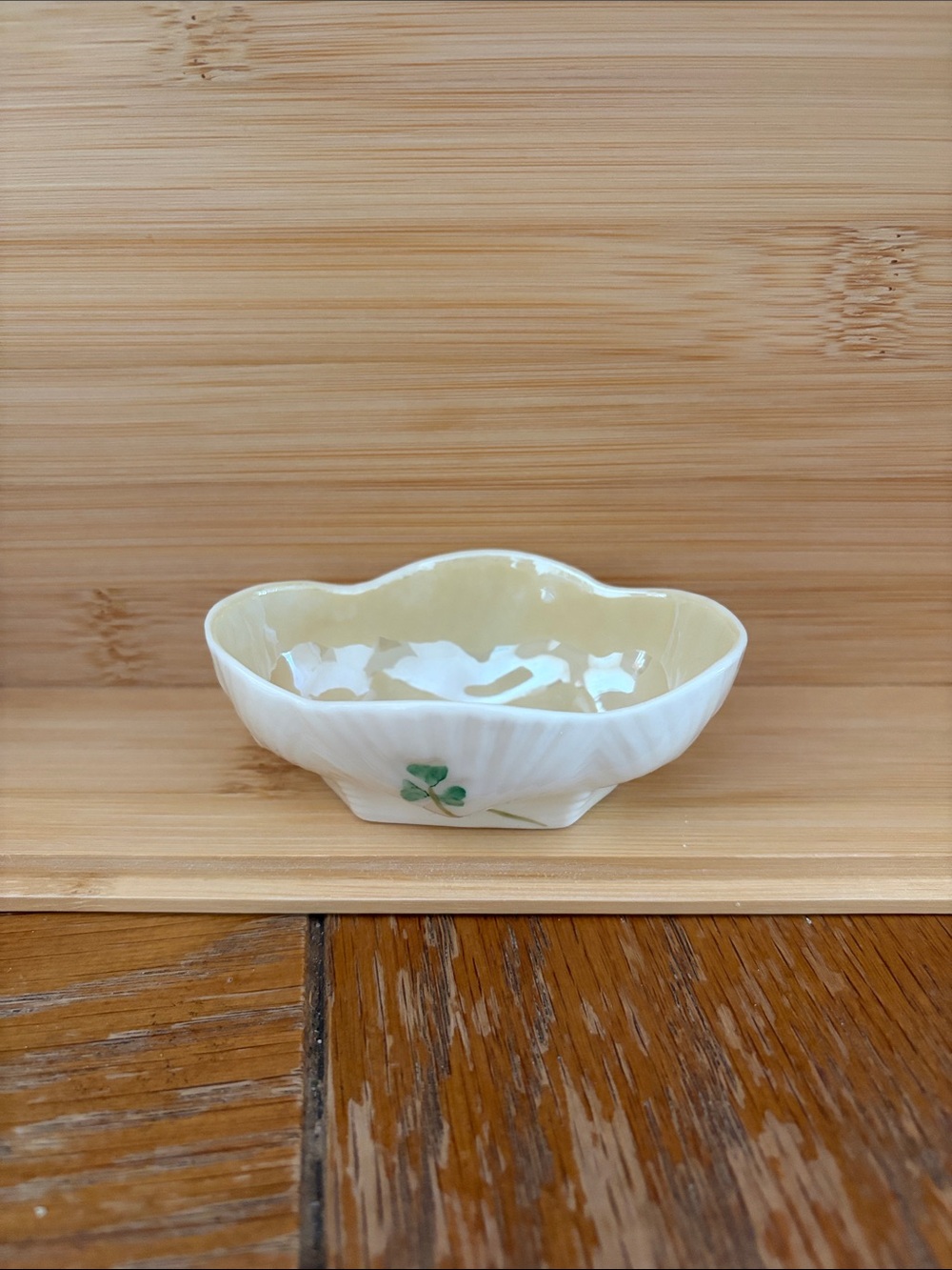 Belleek Cream and White Scalloped Bowl with Green Clover Motif